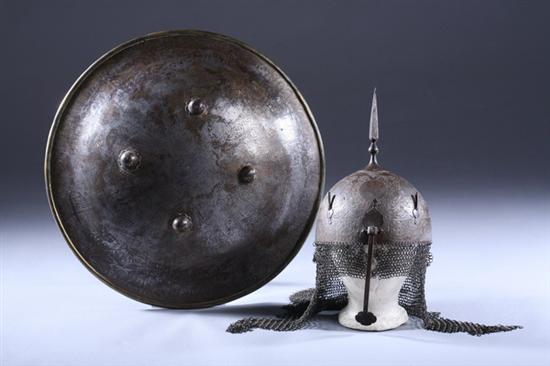 Appraisal: QAJAR DAMASCENED STEEL HELMET AND SHIELD Iran th century The