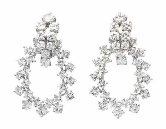 Appraisal: A Pair of Platinum and Diamond Pendant Earrings containing round