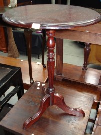 Appraisal: A mahogany circular wine table