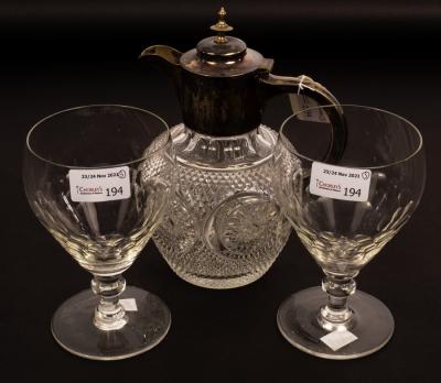 Appraisal: A pair of wine glasses with thumb pressed decorated bowls