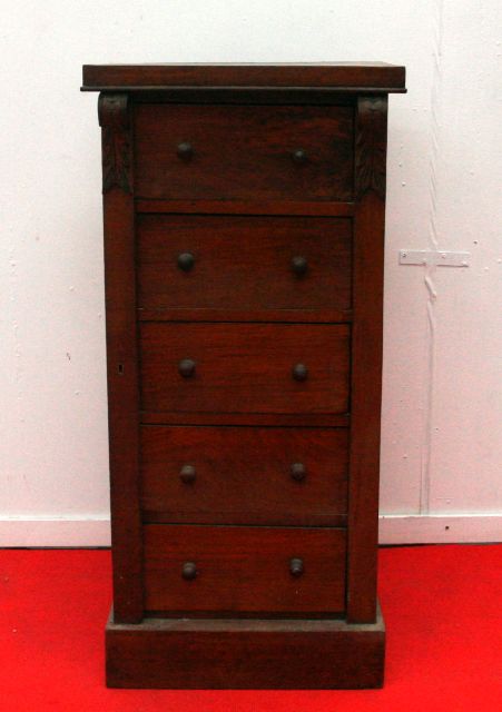 Appraisal: A Victorian walnut Wellington chest