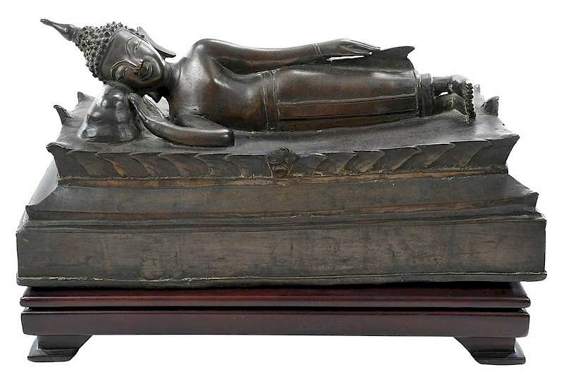 Appraisal: Bronze Figure of Reclining Buddha Thailand th century representing Parinirvana