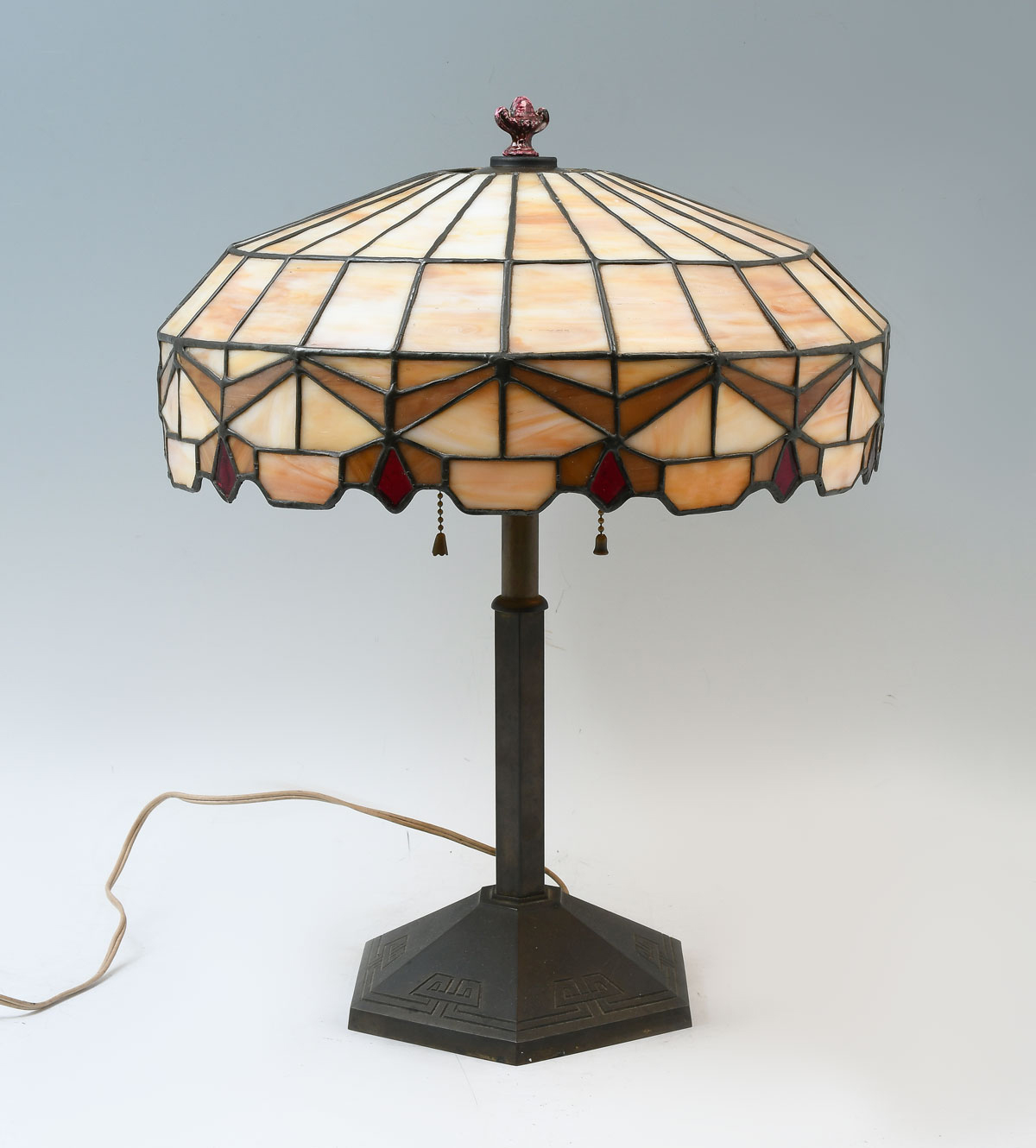 Appraisal: BRADLEY HUBBARD STAINED GLASS LAMP Paneled caramel slag glass shade