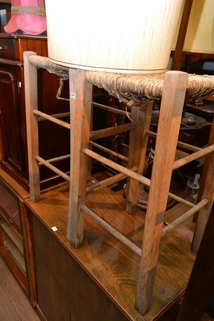 Appraisal: THREE RUSH SEAT BAR STOOLS THREE RUSH SEAT BAR STOOLS