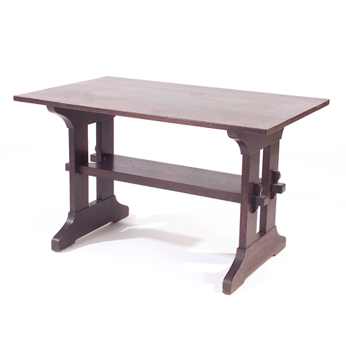 Appraisal: GUSTAV STICKLEY Trestle table with heavy stretcher mortised with keyed