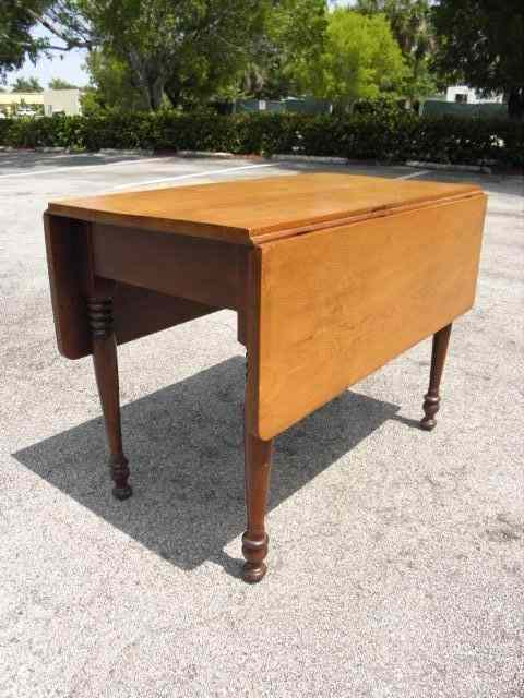 Appraisal: th century drop leaf side table Condition wear to finish