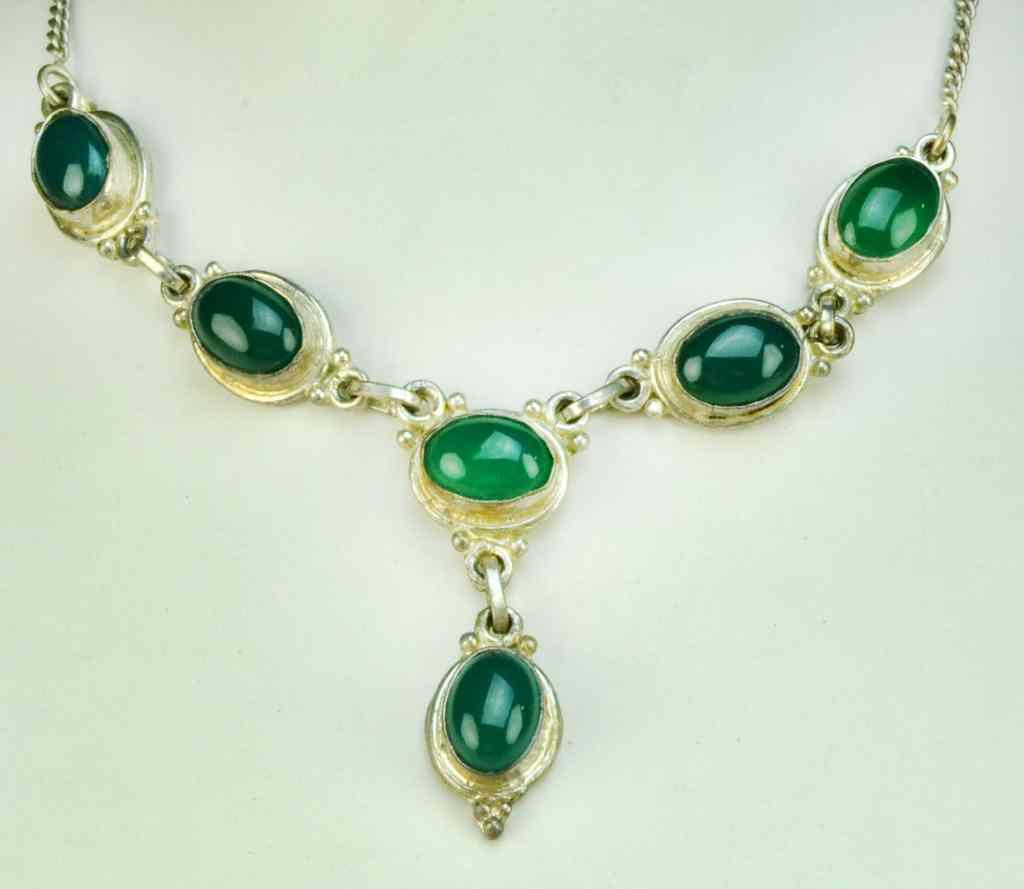 Appraisal: Chinese Jade And Silver Mounted NecklaceSix silver mountings each set