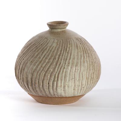 Appraisal: Katharine Pleydell-Bouverie British - a circular spirally fluted stoneware vase