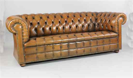 Appraisal: A Lexterten Ltd tan leather button back Chesterfield ft ins