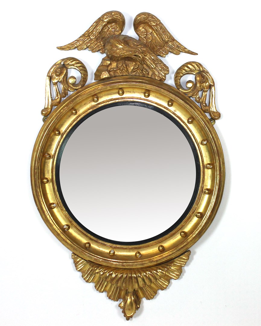 Appraisal: A William IV gilt framed convex mirror with eagle surmount