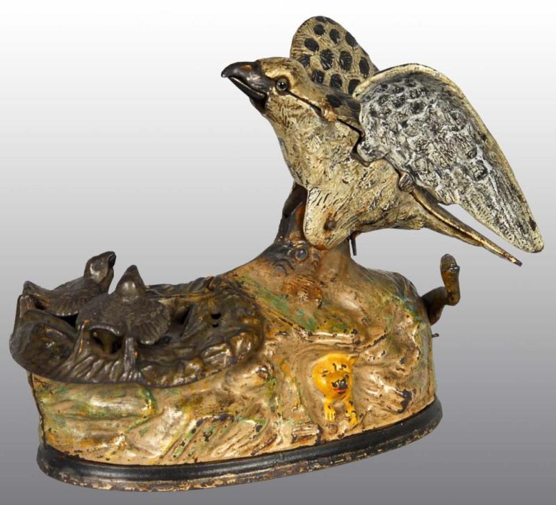 Appraisal: Cast Iron Eagle Eaglettes Mechanical Bank Description Manufactured by J