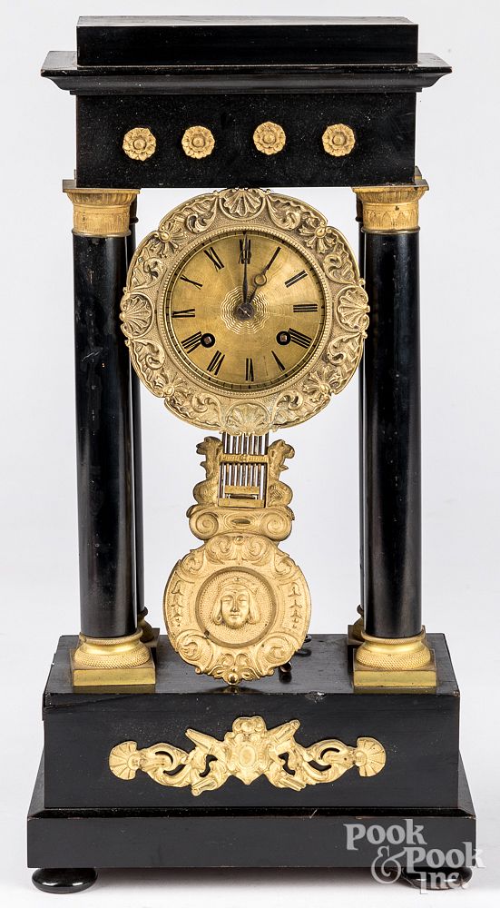 Appraisal: French ebonized portico clock th c French ebonized portico clock