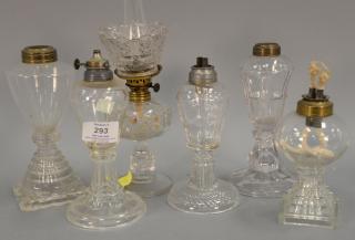 Appraisal: Six clear whale oil lamps are sandwich pressed glass ht