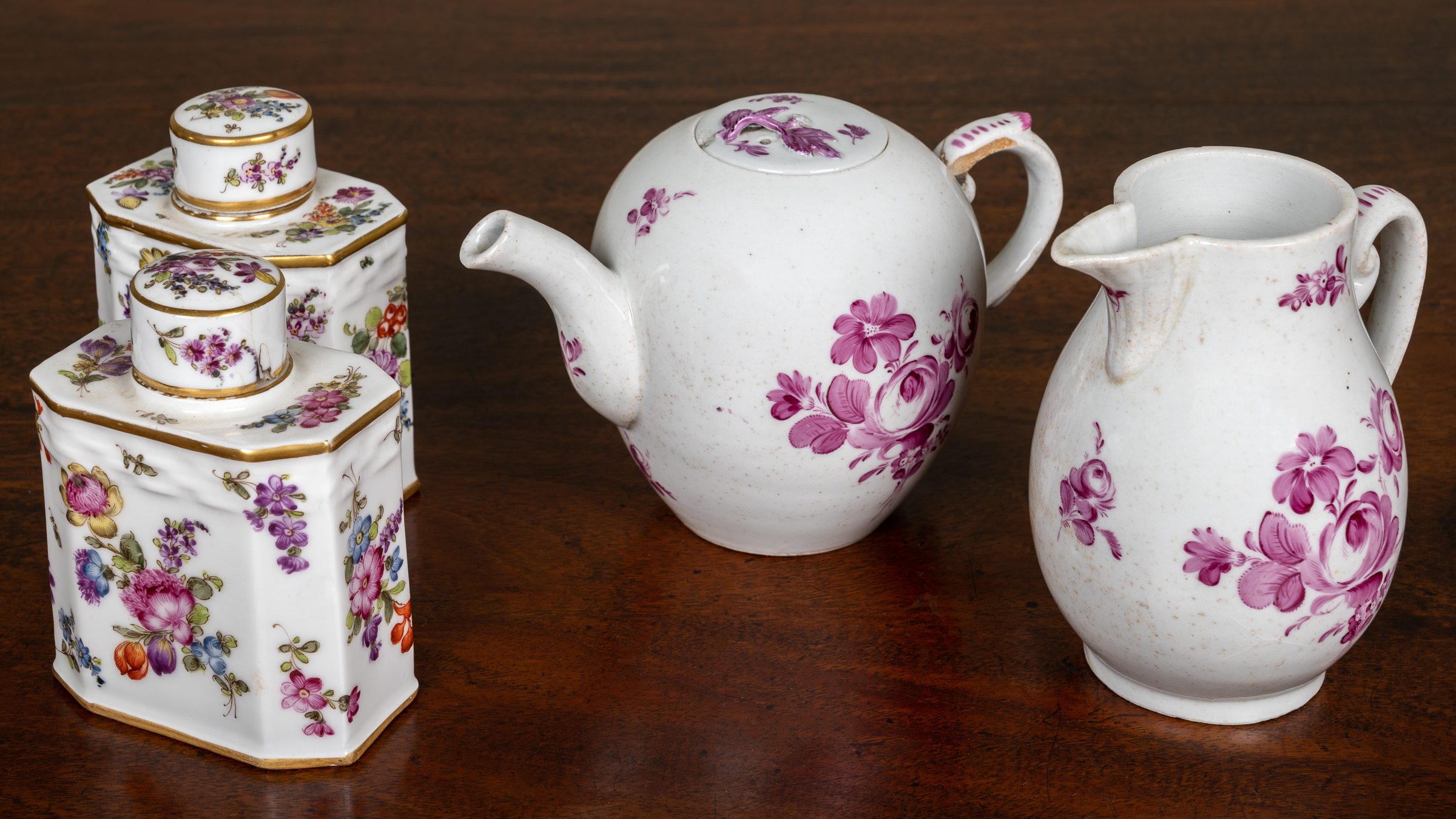 Appraisal: A pair of Meissen-style porcelain flower decorated tea canisters each