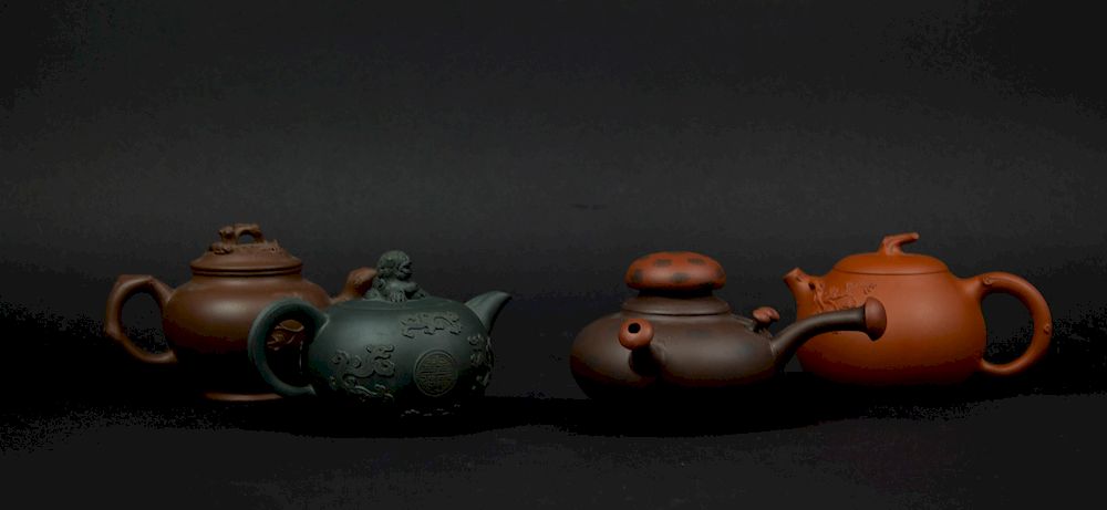 Appraisal: Group of Four Yixing Teapots Including one mushroom-form pot and