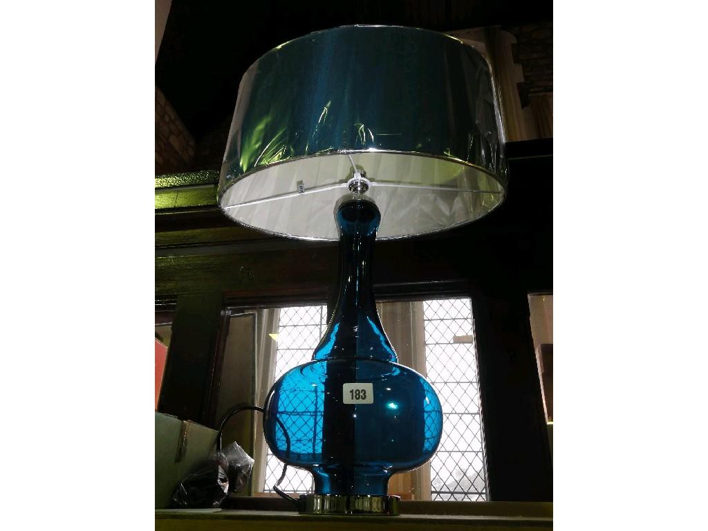 Appraisal: A large blue glass lamp base fitted with an oval