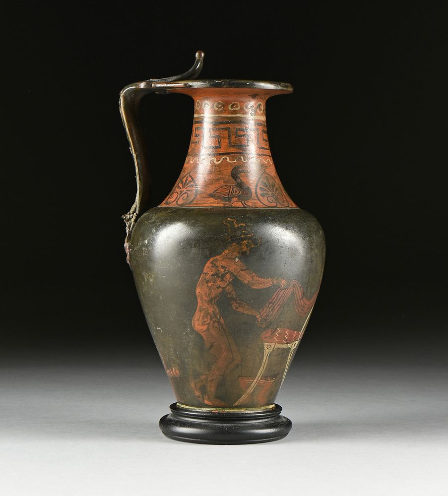 Appraisal: A ROMAN STYLE RED FIGURE POLYCHROME BRONZE OINOCHOE WINE VESSEL