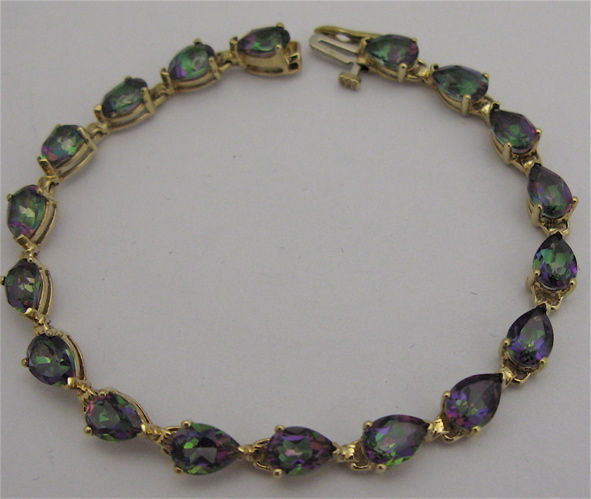 Appraisal: MYSTIC TOPAZ AND KARAT GOLD BRACELET - in length and