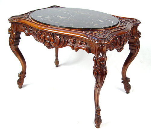 Appraisal: CARVED FRENCH BLACK MARBLE TOP SIDE TABLE Oval marble insert