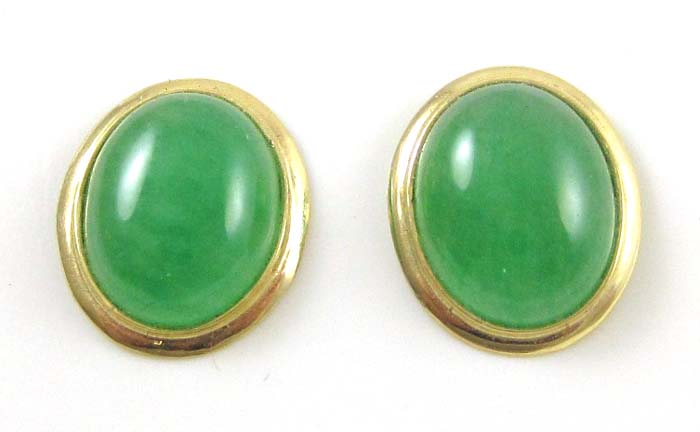 Appraisal: PAIR OF GREEN JADE EARRINGS each with oval jade cabochons