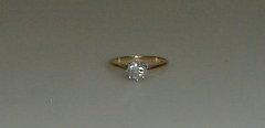 Appraisal: A diamond solitaire ring mounted estimated weight ct heavily included