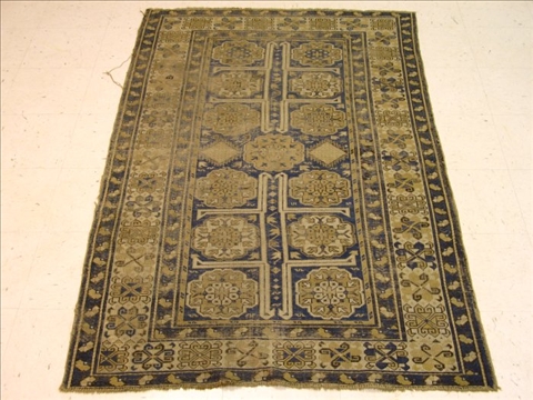 Appraisal: CAUCASIAN RUG Circa with thirteen rosettes flanked by stylized birds