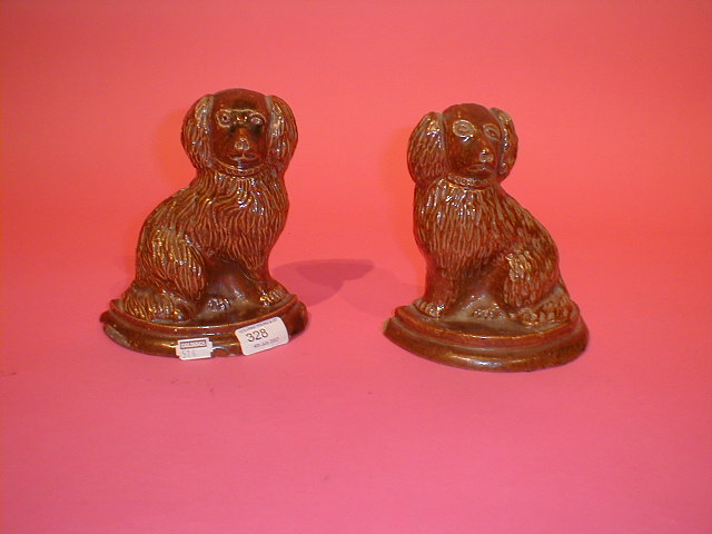 Appraisal: A pair of Derby Nottinghamshire salt glazed stoneware door stops