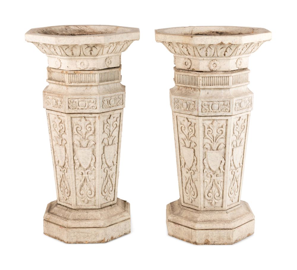 Appraisal: A Pair of Glazed Terra Cotta Urns and Pedestals A