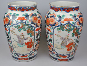 Appraisal: A pair of Japanese Imari vases each decorated with two