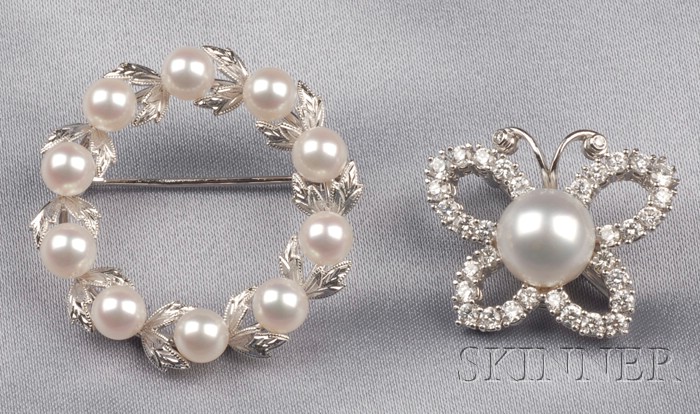 Appraisal: Two Cultured Pearl Pins an kt white gold platinum and