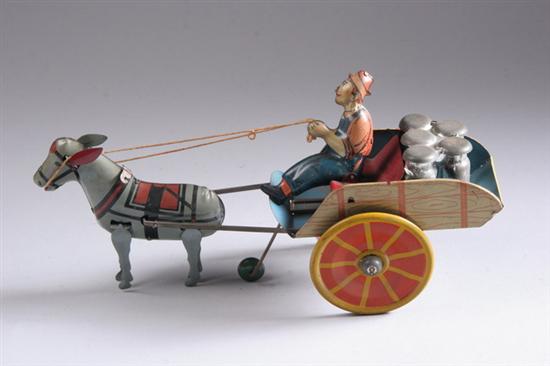 Appraisal: MARK HEE HAW BALKY MULE TIN TOY Tin litho driver