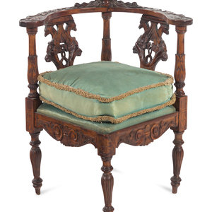 Appraisal: An English Carved Walnut Corner Chair Early th Century Height