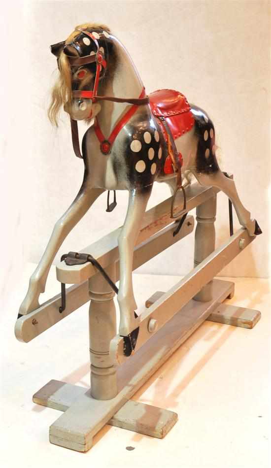 Appraisal: An early th century painted rocking horse Carved and with