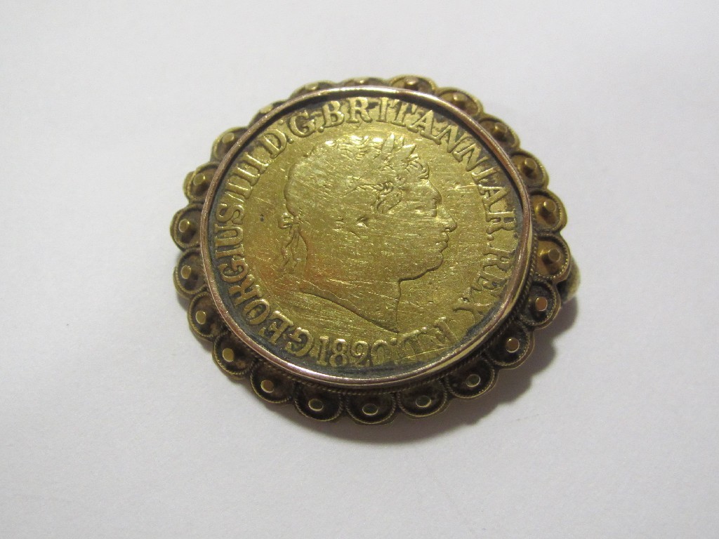 Appraisal: George III gold coin in yellow metal brooch mount Gross