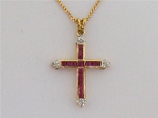 Appraisal: An carat gold ruby and diamond cross pendant set overall