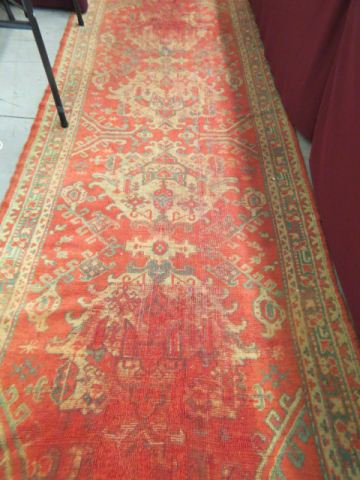 Appraisal: Oushak Persian Handmade Rug fancy medallion red field some wear