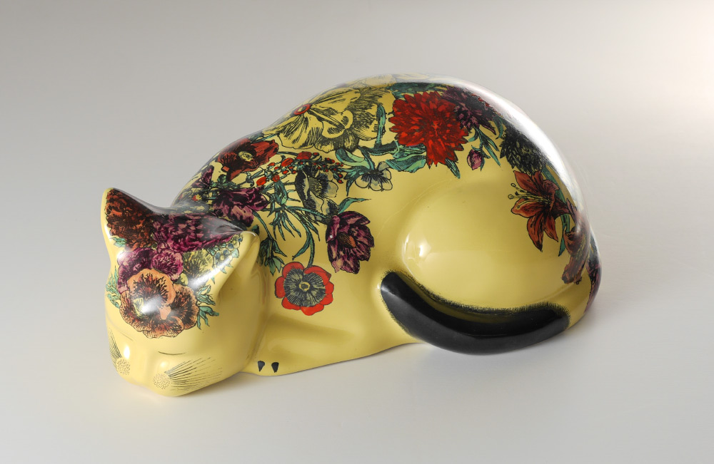 Appraisal: PIERO FORNASETTI FLORAL PORCELAIN CAT FIGURE Yellow ground with enhanced