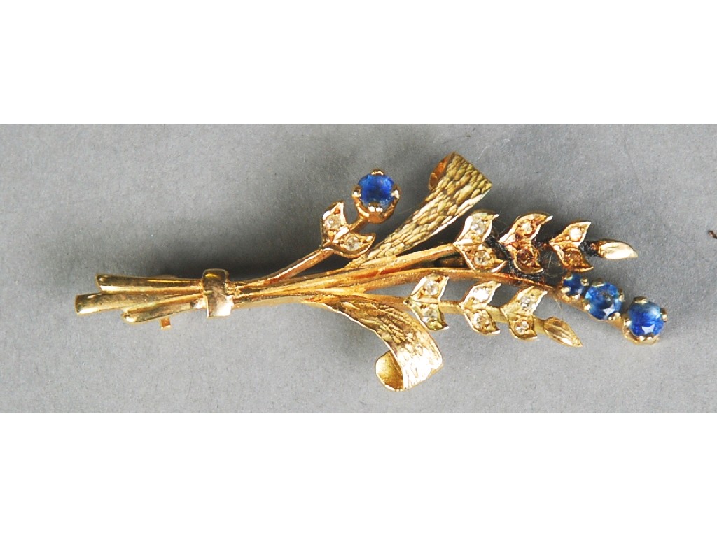 Appraisal: ct GOLD DIAMOND AND SAPPHIRE SPRAY BROOCH floral foliate and