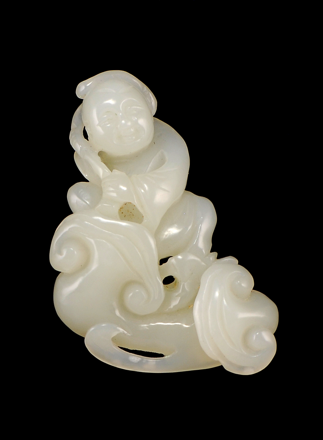 Appraisal: WHITE JADE CARVING In the form of a sage and