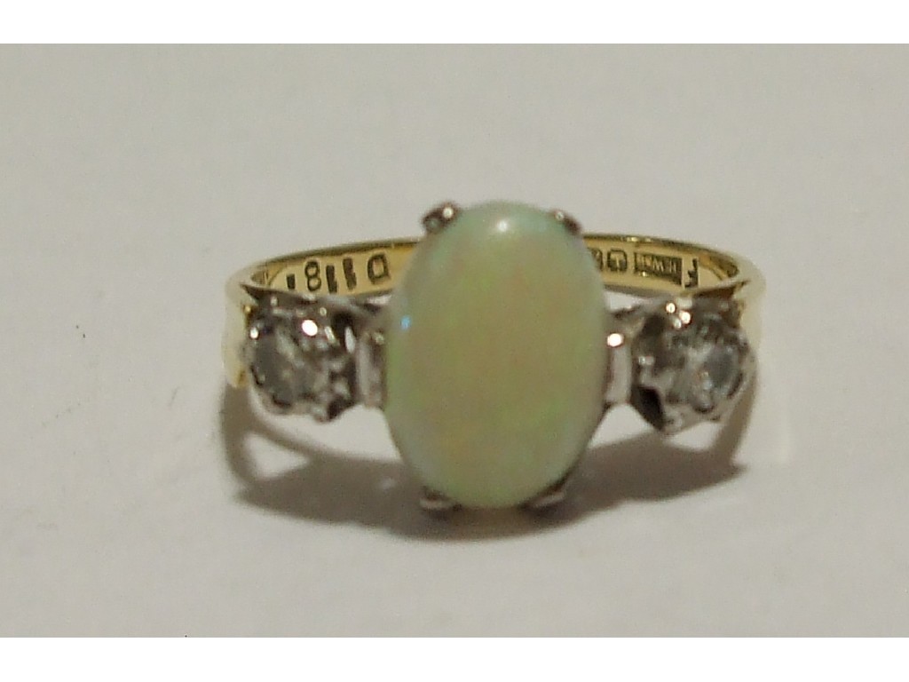 Appraisal: Edwardian ct gold opal and diamond three stone ring