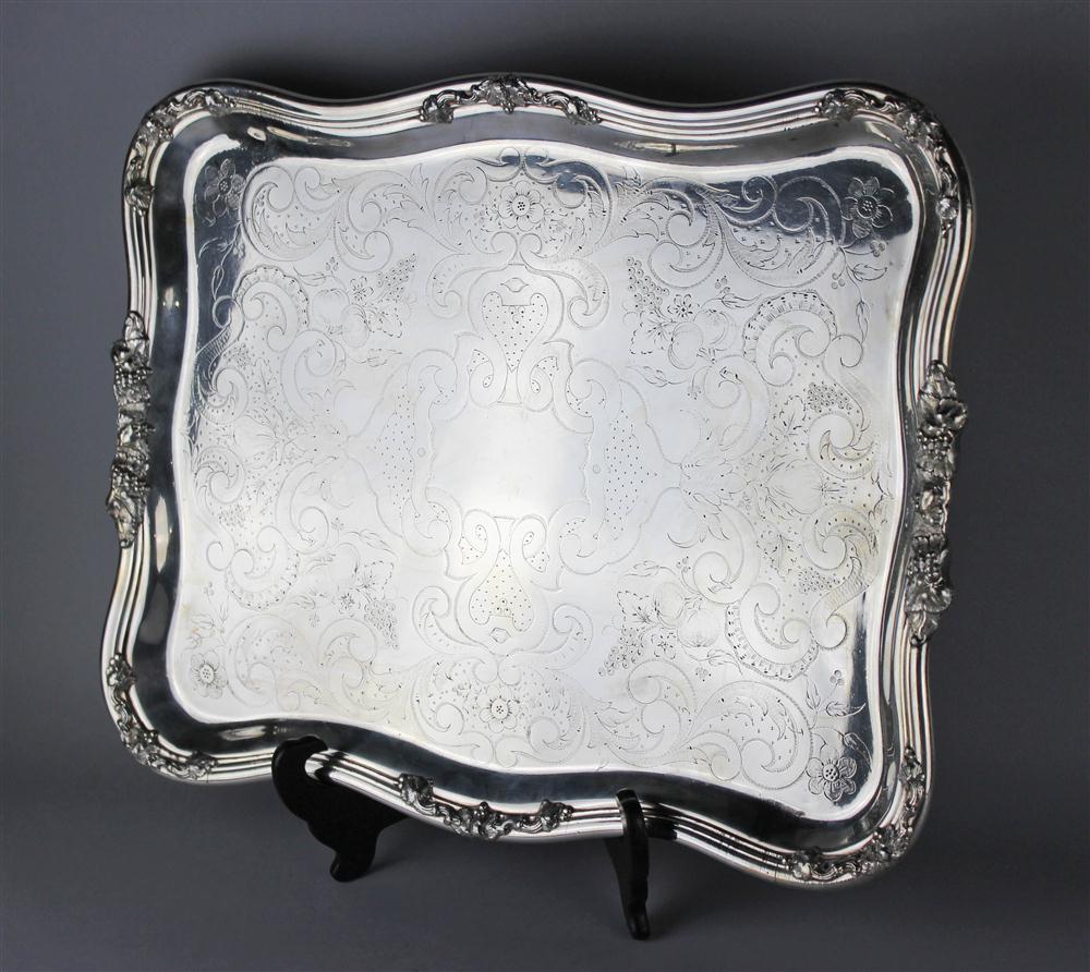 Appraisal: BRAZILIAN SILVERPLATED RECTANGULAR TRAY the center chased with scrolls and