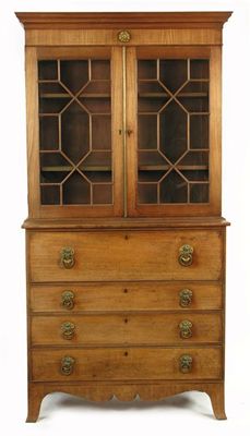 Appraisal: A mahogany secretaire bookcase with boxwood stringing the detachable cornice