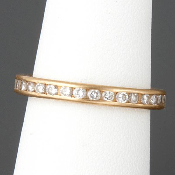 Appraisal: A diamond and k gold eternity band signed Tiffany amp