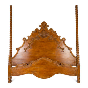 Appraisal: A Spanish Colonial Style Carved Walnut Bed with headboard footboard