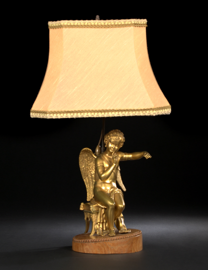 Appraisal: Continental Gilt-Brass Figure of a Putto in the neoclassical taste