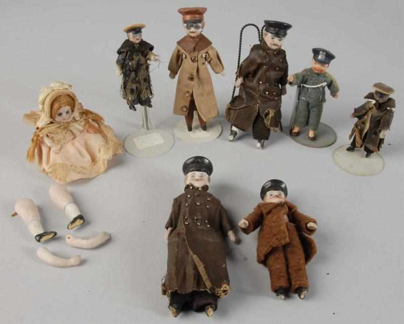 Appraisal: Lot of Bisque Head Chauffer Other Figures Description German Includes