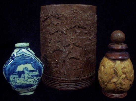 Appraisal: A Japanese carved bamboo pot decorated buildings and deer cm