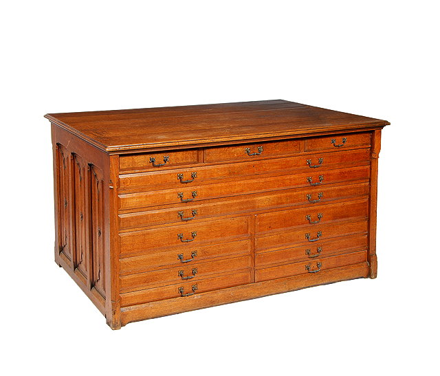 Appraisal: A VICTORIAN OAK LIBRARY PLAN CHEST having an arrangement of