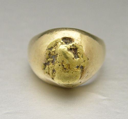 Appraisal: K K NUGGET MAN'S RING K yellow gold ring Domed