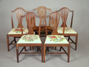 Appraisal: A set of four mahogany dining chairs early th century